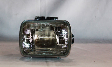 1984-2001 Jeep Cherokee/Comanche/Wagoneer/Wrangler Driver Side Headlight Assembly W/Quad Lamps Low Beam Includes Housing/Rim/Sealed Beam Sealed Beam - CH2500103-Partify-Painted-Replacement-Body-Parts