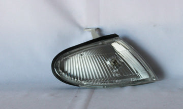 1995-1996 Mazda Protege Passenger Side Parking Light Assembly - MA2521108-Partify-Painted-Replacement-Body-Parts